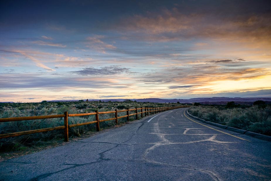 open road with sunset